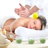 Pixwords Bildet med kvinne, terapi, massasje, gul, blomst Kurhan - Dreamstime