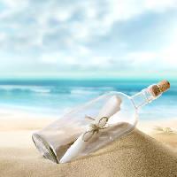 Pixwords Bildet med flaske, sjø, sand, papir, hav Silvae1 - Dreamstime