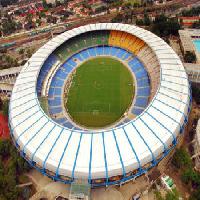 Pixwords Bildet med arena, fotball, grønn, stadion, by, spill, Megumi - Dreamstime